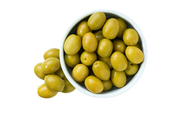 marinated green olives in a white ceramic bowl isolated on a white background. Top view.