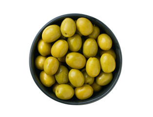 marinated green olives in a black ceramic bowl isolated on a white background. Top view.