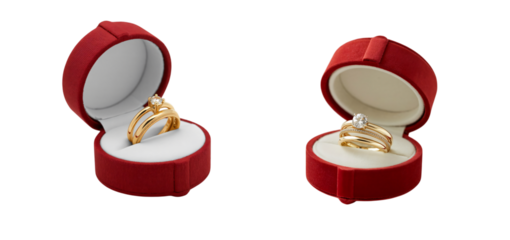Two elegant gold diamond rings displayed in red ring boxes