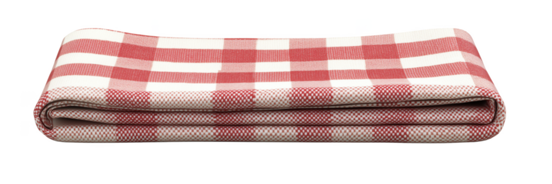 Red and white checkered picnic blanket folded neatly for outdoor use, PNG with copy space