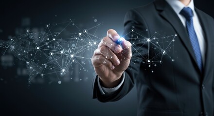 Man in suit points at network of connected dots on dark background.