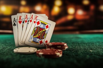 High stakes poker game with winning hand at a casino table late at night