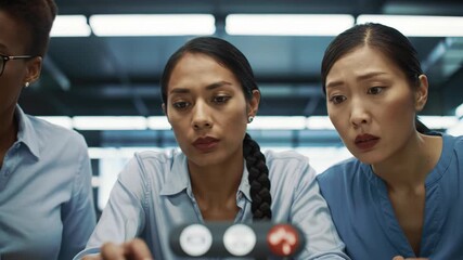 Three diverse business women in a video call, team having meeting online, communication and technology, modern workspace, looking at the monitor, diverse group. - Powered by Adobe
