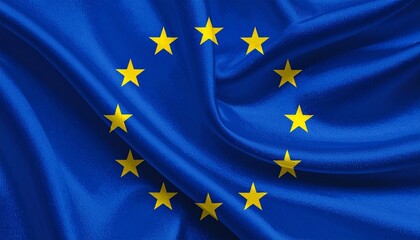 European Union flag with twelve gold stars on blue, slightly wrinkled fabric, symbol of unity and harmony.