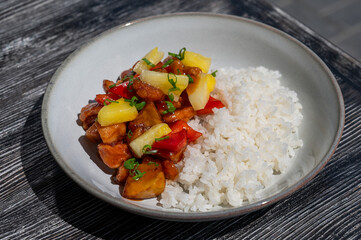 Chicken with pineapple in teriyaki sauce with fried rice. 