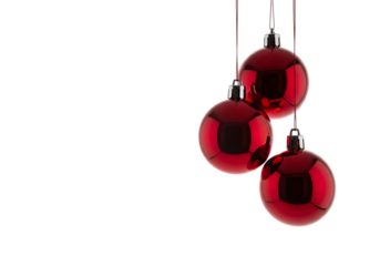 Three shiny red christmas baubles hanging together as festive holiday decorations isolated on transparent background