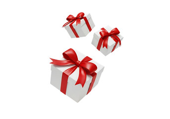 Three white gift boxes with red ribbons and bows floating in the air isolated on transparent background