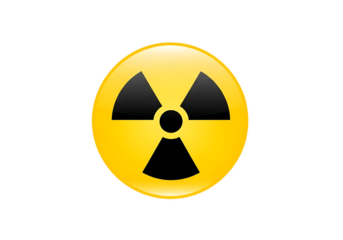 Bright yellow circular radiation hazard symbol with black trefoil icon isolated on transparent background