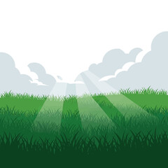 Obraz premium Sunlight streams through clouds onto a vibrant green grassy field, creating a serene and hopeful natural landscape.