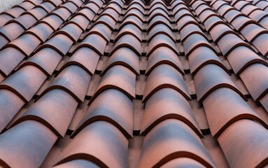 Terracotta clay roof tiles with barrel profile and row pattern