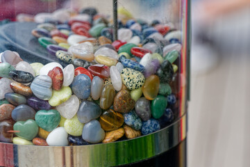 Colorful heart stone dispenser in coin operated souvenir machine