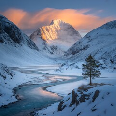 Majestic snow covered mountain peak illuminated by golden sunrise light