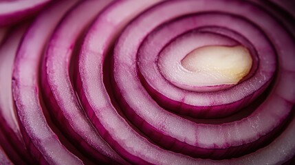Close-up view of sliced red onion rings.