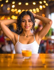 Woman in cafe, holding hair, drink