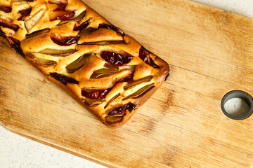 Homemade Apple Pie on Wooden Cutting Board – Rustic Autumn Dessert