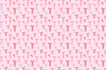Pattern with pink and colorful cute bows. Watercolor style. Gift wrapping for Christmas.