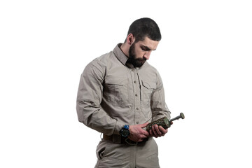 Young Man Holding a Bomb on White Background