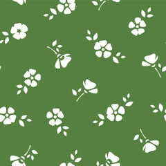 Seamless floral pattern with small flowers on green. Vector floral print with white flowers silhouettes on a green background