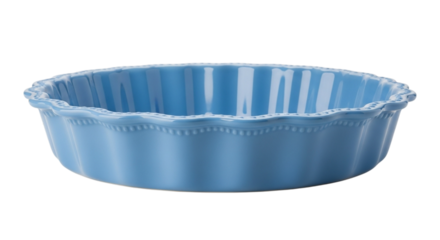 Empty ceramic pie dish with blue scalloped edge for baking and dessert concepts, isolated on white and transparent background