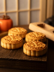 Go home to eat mooncakes during the Mid-Autumn Festival.