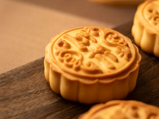 Go home to eat mooncakes during the Mid-Autumn Festival.