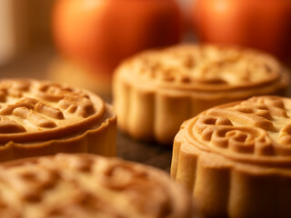 Go home to eat mooncakes during the Mid-Autumn Festival.