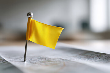 macro shot of map featuring bright flag pin labeled attractions essence of travel
