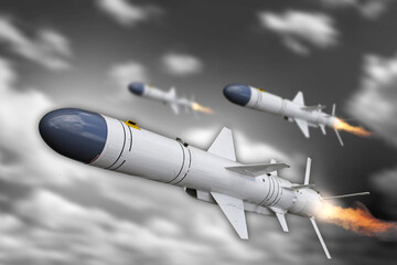 Military technology and defense, flying missiles with engines ignited in cloudy sky, weapons, war,...