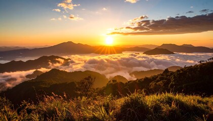 Sunrise over misty mountains