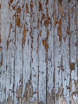 Texture of old paint and weathered wood