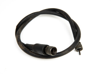 Fototapeta premium Motorcycle speedometer cable isolated on white background, spare part for bike repair and maintenance.