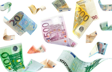 Money (euro bills) flying against white background