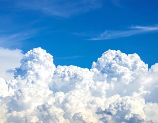 Naklejka premium Fluffy white clouds against a vibrant blue sky