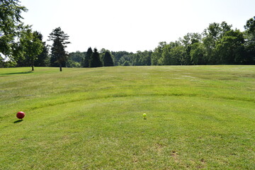 Looking from the tee-off starting point towards the golf course fairway.