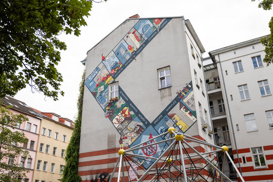 BERLIN, GERMANY - 6. August 2025: Graffiti "Berlin not for Sale" (2014) on a house wall showing a Monopoly board with different locations of the city by Orangotango, Pappsatt and Reclaim Your City.