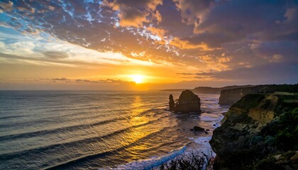 Dramatic sunset over a rocky coastline