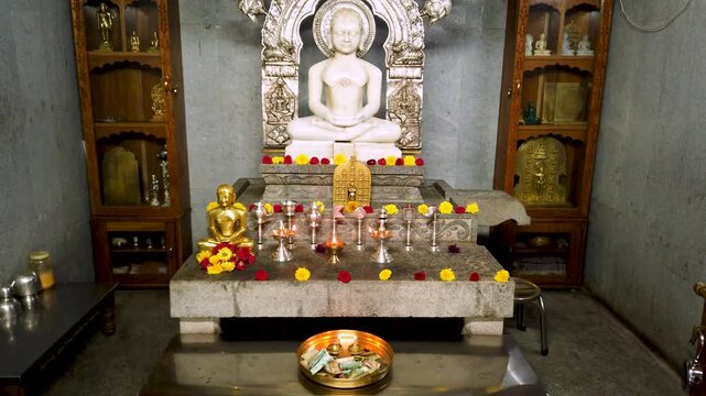 Mysuru, Karnataka, India-September 8 2025; A White marble sculpture of Lord Mahavira, worship, spirituality, religion, temple, divine, Jainism during Mahavir Jayanti festival in India.
