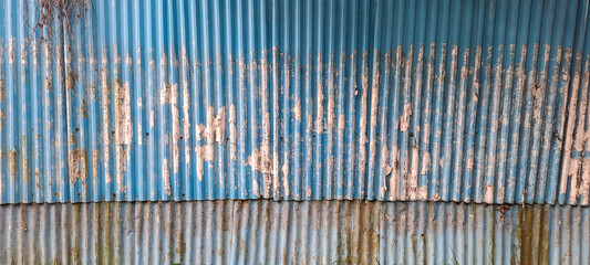 Old zinc vintage fence wall texture for background, pattern of rusty on metal panel.Tin Roof wall countryside	