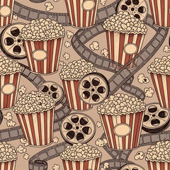 Vintage cinema seamless pattern with hand-drawn popcorn and film reels. A retro movie night background illustration, perfect for entertainment-themed designs.