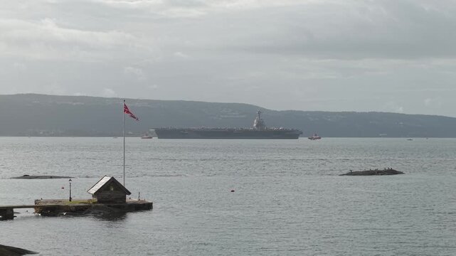 Oslo Fjord With USS Gerald R. Ford Aircraft Carrier Of the US Navy In Oslo, Norway. - wide shot