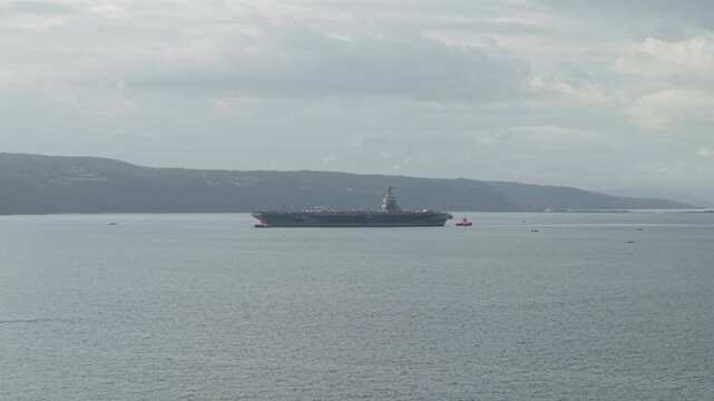 USS Gerald R. Ford Carrying Aircrafts Sailing In The Fjord Of Oslo In Norway. - aerial shot