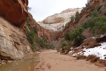 Narrow canyon, winter scene, sandy riverbed