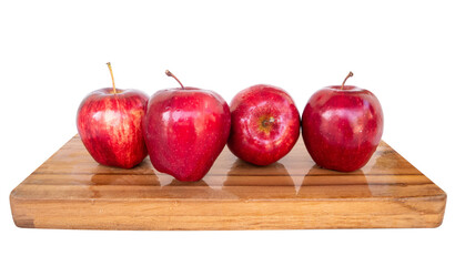 fresh red apples on wooden tray