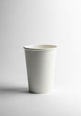 Close Up of a White Paper Cup on a Light Gray Seamless Background