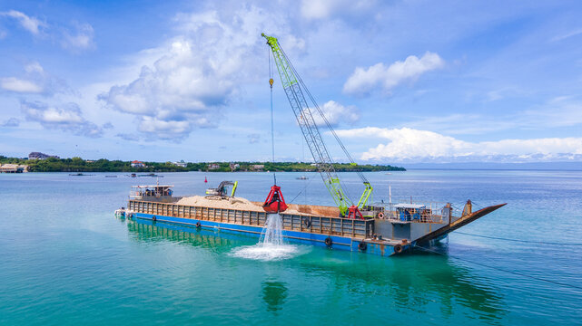 Marine Dredging Barge with Crane Excavating Seabed Soil