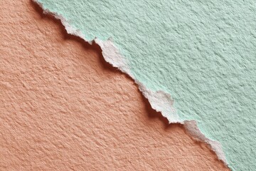 Torn peach and mint paper backdrop