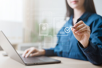 Businessman reviewing digital documents with stylus on laptop. Perfect for concepts of document management, checklist, audit, compliance, workflow, e-signature, productivity, office, and technology.