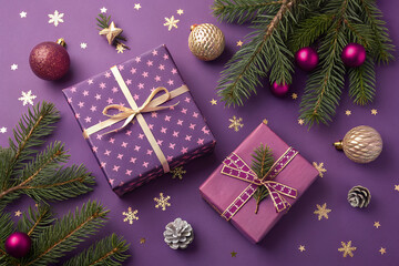 Festive Gift Boxes with Holiday Accents: Captured from a bird's-eye perspective, beautifully wrapped gift boxes with delicate ribbons rest alongside shimmering baubles, festive pine branches.