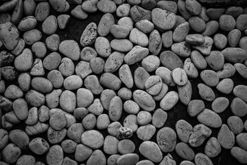 Monochrome Close-Up River Rock Bed Pattern Background Image