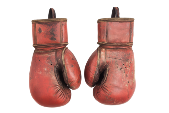 Vintage red leather boxing gloves isolated on transparent background. Pair of old red leather boxing gloves hanging isolated on white background.